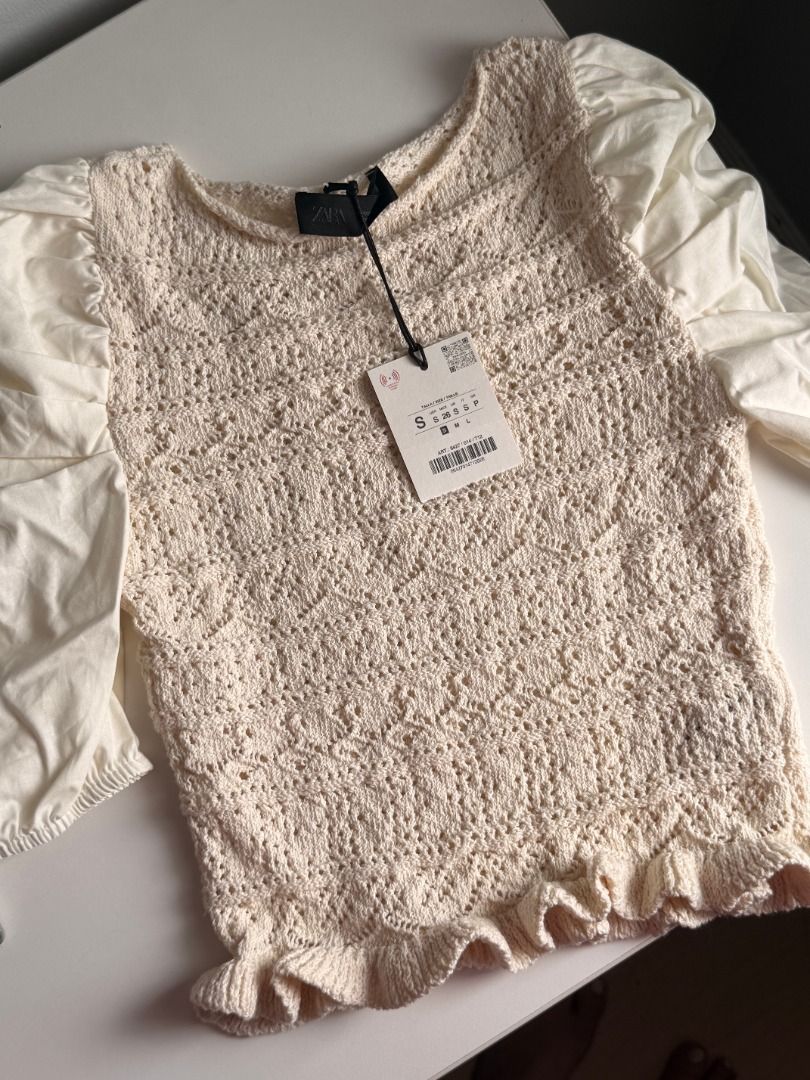 Zara Cream Crochet Top (Size S) (Category: Blouses) located in San Juan City. Submitted by maxiepie (Listing ID 1456573087, Image 1). Description: Brand new and selling for 50% off. Comes with original tag. Features: - Retails for approximately $44 or P2,700 - Crocheted body with puff sleeves - Can be dressed up or down - Perfect for summery, casual, boho, beach, and city looks - Size S RFS: Gift, won't use.