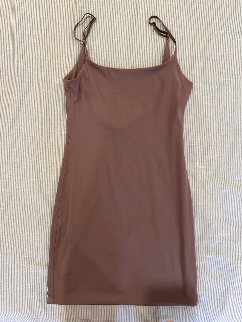 Zara Nude Bodycon Backless Mini Dress (Category: Dresses) located in Paranaque City. Submitted by lbtcloset (Listing ID 1456445069, Image 3). Description: -Size S -Used only once, very flattering! -RFS: Not my style anymore -MOP: Gcash / BPI -MOD: Gogo Express, Lalamove, Grab Express (Other couriers may be booked and shouldered by buyer).
