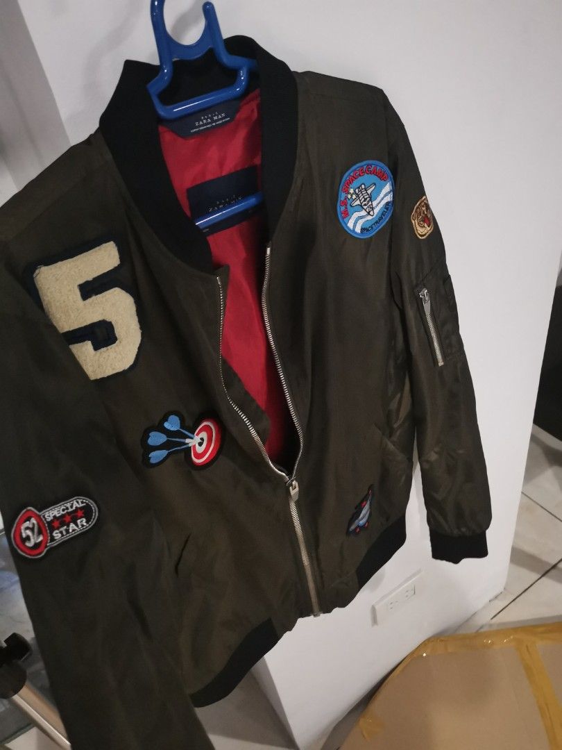 Zara Patchwork Military Green Bomber Jacket (Category: Coats, Jackets and Outerwear) located in Manila. Submitted by hb1118 (Listing ID 1456579519, Image 2). Description: patchwork jacket from Zara 2016 Barely used Olive Green with red lining no issues .