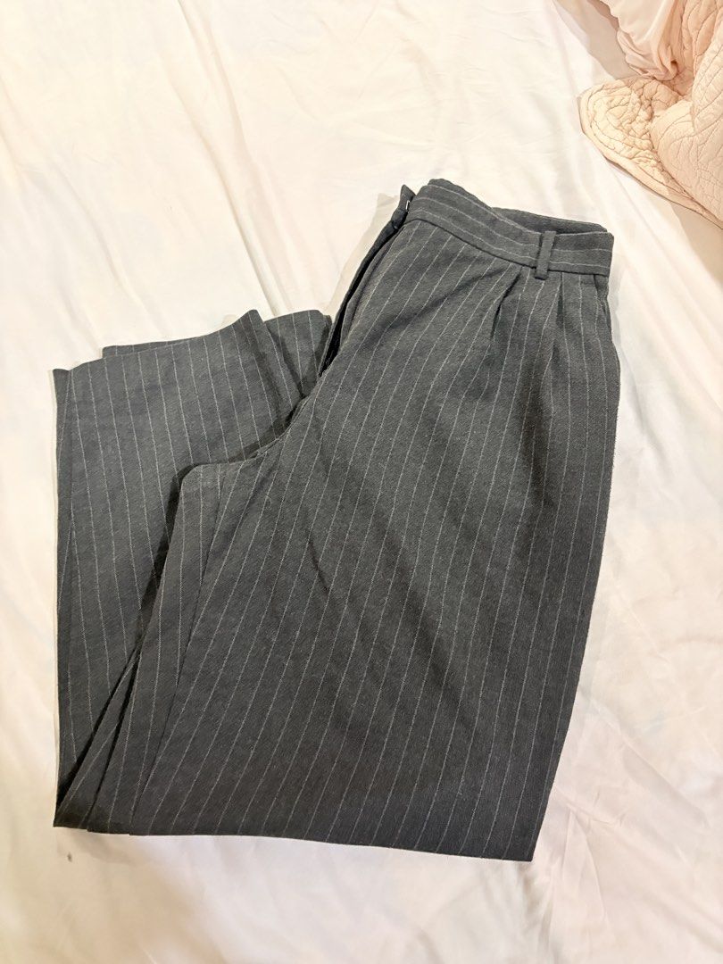Zara Striped Tailored Pants (Category: Other Bottoms) located in Manila. Submitted by sofiacarm15 (Listing ID 1456533950, Image 1). Description: - Zara Grey Pinstripe Pants - Size: L - Tailored fit for a classic look - Features belt loops and zip closure - Ideal for workwear or smart casual outfits - No flaws, but used a lot of times.