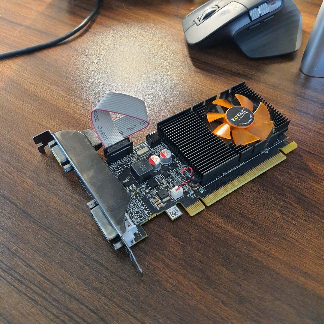 ZOTAC NVIDIA GeForce GT 710 2GB DDR3 Graphics Card (Category: Computer Parts) located in Caloocan City. Submitted by euphoriaxxxxx (Listing ID 1456439737, Image 1). Description: - ZOTAC GT 710 Graphics Card - 2GB DDR3 Memory - Outputs: DVI, HDMI, VGA - Ideal for basic PC builds or upgrading older systems - Tested and confirmed working Specifications: GPU: NVIDIA GeForce GT 710 Brand: ZOTAC Model: ZT-71310-10L Video Memory: 2GB DDR3 Memory Bus: 64