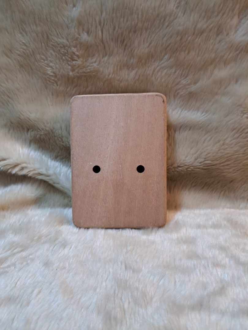17 Key Kalimba Thumb Piano with Deer Design (Category: Musical Instruments) located in Quezon City. Submitted by sbvdmanaog (Listing ID 1453419008, Image 3). Description: - Adorable wooden 17-key kalimba with a cute deer and snowflake design. - Ideal for beginners and music enthusiasts. - Easy to play and highly portable for on-the-go melodies. - Perfect for creating relaxing and soothing music. - Features two sound holes on the back for enhanced