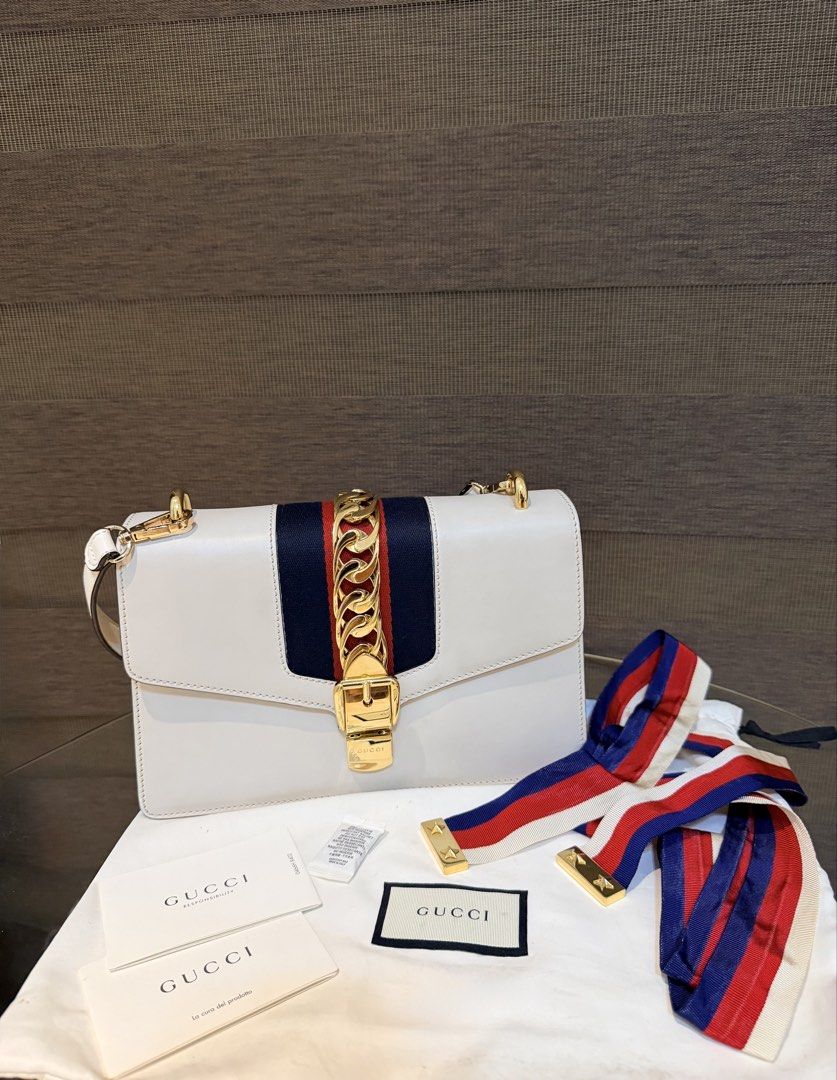 99% New Gucci Sylvie Shoulder Bag Complete Set (Category: Luxury Bags & Wallets) located in Manila. Submitted by sweetluxuryph (Listing ID 1453046604, Image 2). Description: - Gucci Sylvie shoulder bag - Condition: 99% new (like new) - Comes with complete set - Original store price: PHP 150,000 - Selling price: PHP 44,000 - Features: Beautiful, chic, and stylish - Versatile: Perfect for any occasion.