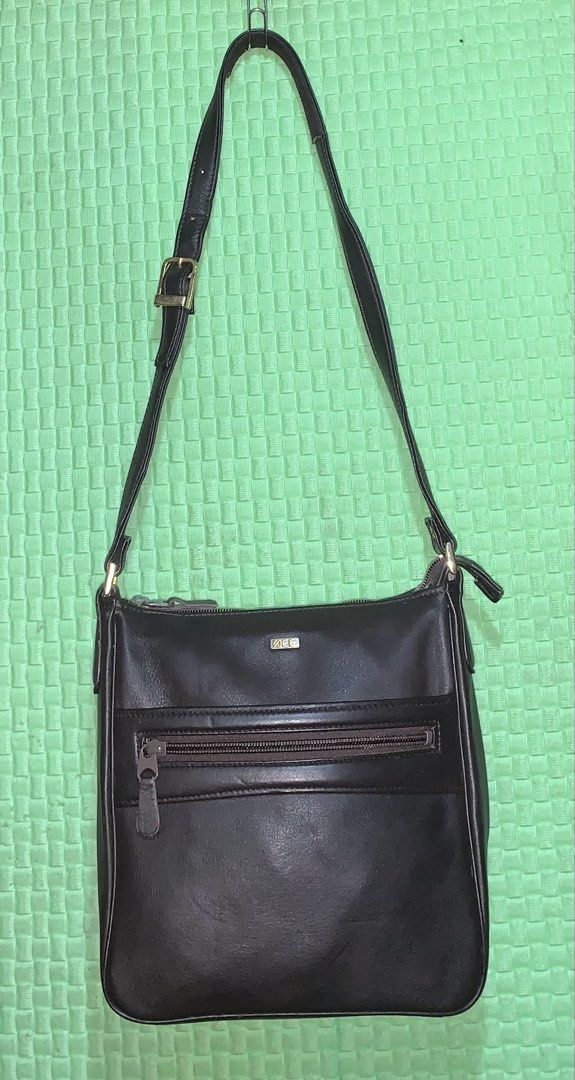 ACE LIMITED EDITION Brown Leather Shoulder Bag (Category: Shoulder Bags) located in Carigara. Submitted by spark2503 (Listing ID 1453271960, Image 1). Description: - Classic brown shoulder bag - Genuine leather material - Main zip compartment for secure storage - Additional front zip pocket for quick access - Adjustable strap with buckle for a customized fit - Elegant gold hardware details - Simple and functional design - Ideal for everyday use.