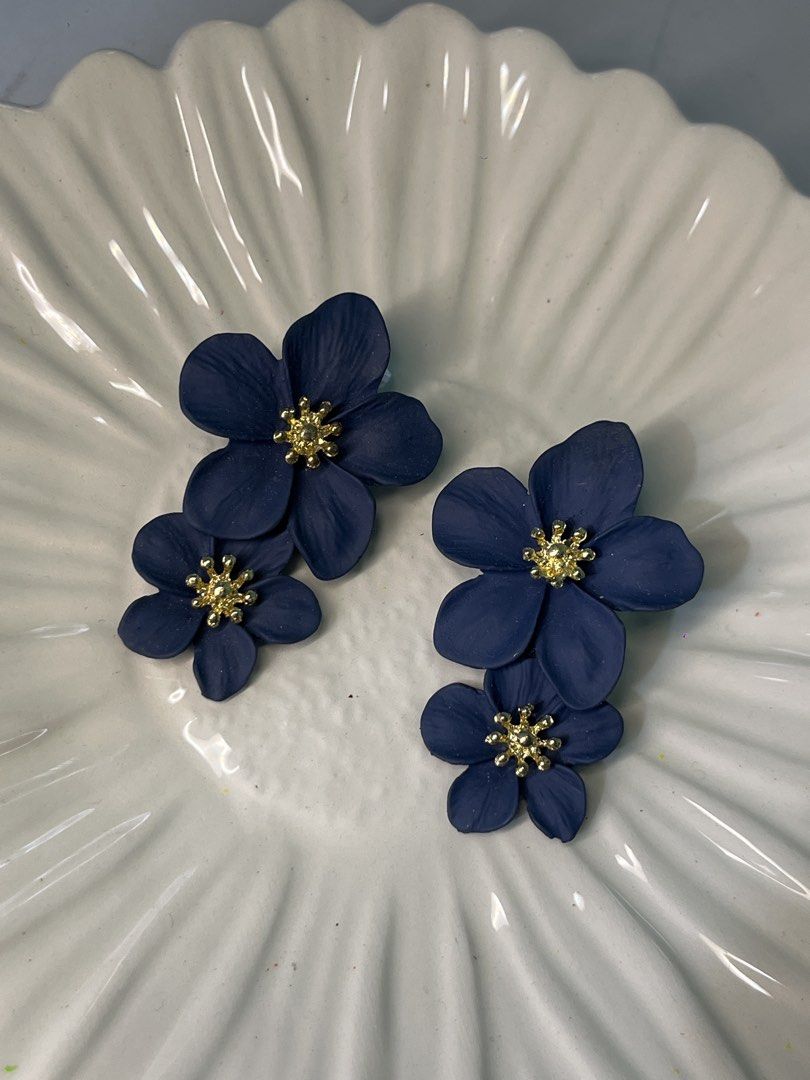 Assorted Earrings: Flower, Petal, Hoop Styles (Category: Earrings) located in San Juan City. Submitted by superash (Listing ID 1453331055, Image 2). Description: -FOR TAKE ALL ONLY!! -Bundle includes 4 pairs of earrings. - Bright pink petal earrings with gold studs. - Navy blue flower earrings with gold centers. - Two pairs of silver hoop earrings: one twisted, one classic thick hoop. - Perfect for creating different looks..