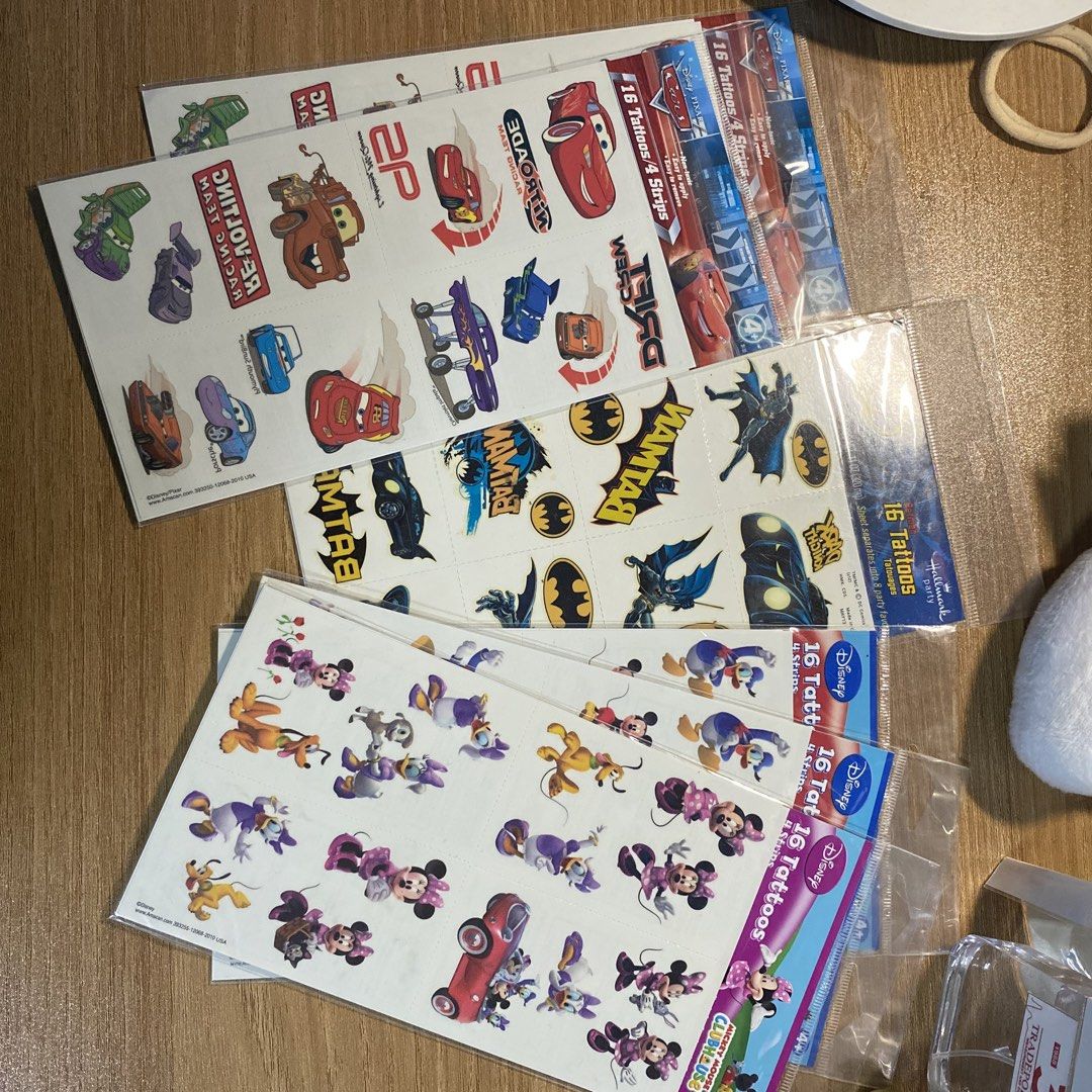 Assorted Temporary Tattoo Stickers - Flowers, Cartoon Characters, & More! (Category: Art & Prints) located in Manila. Submitted by alleyyagap62021 (Listing ID 1453387574, Image 2). Description: - Variety of temporary tattoo sticker packs available. - Designs include floral, cute cartoon characters (Mickey Mouse & friends, Cars, Batman), and animal themes. - Perfect for parties, costumes, or everyday fun. - Features some popular Korean brands. - A