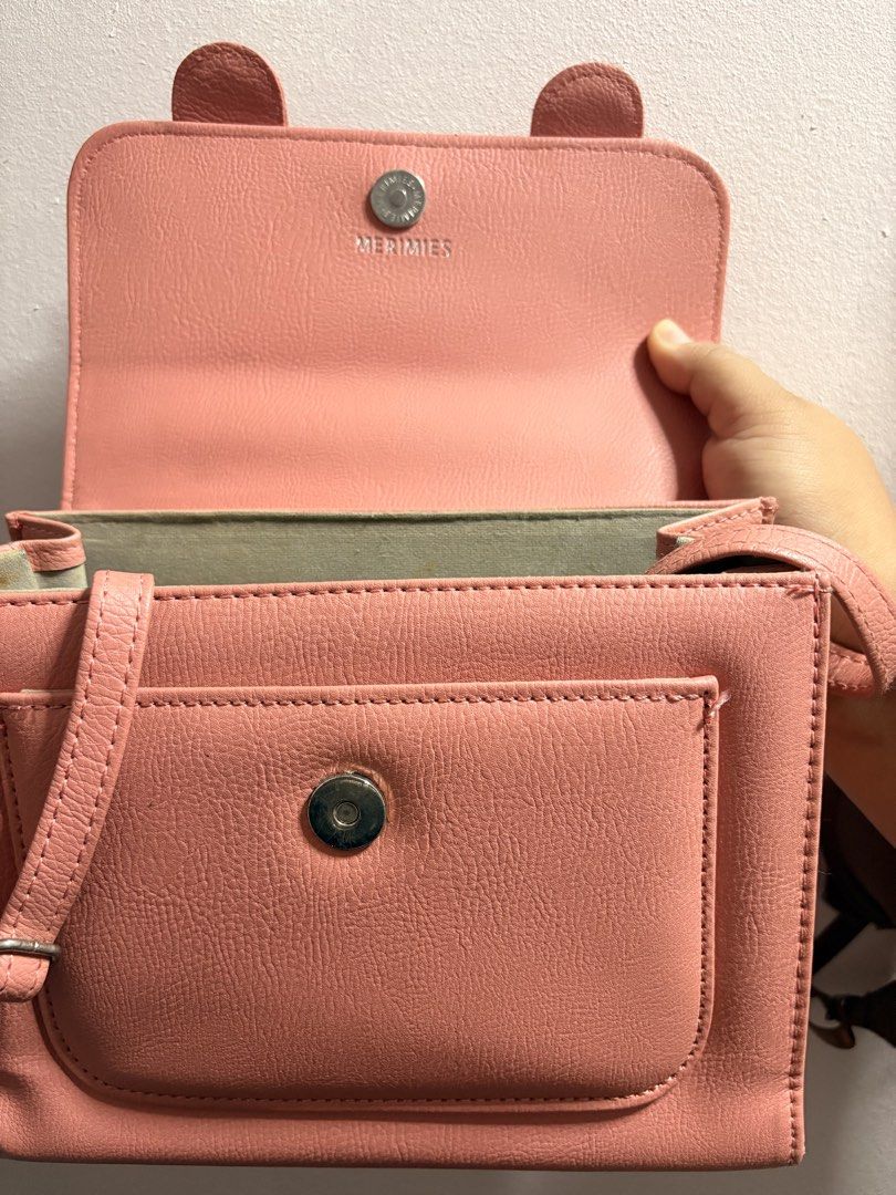authentic Merimies pink crossbody/satchel (Category: Shoulder Bags) located in Manila. Submitted by swift_cosmicocean (Listing ID 1453399401, Image 2). Description: .
