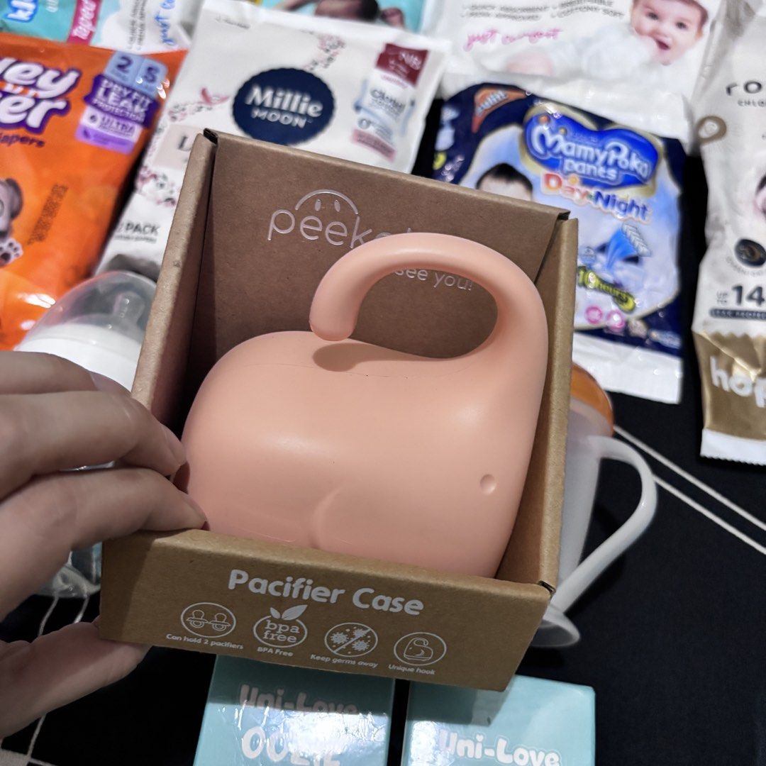 Baby Essentials Bundle (Category: Soothers & Pacifiers) located in Paranaque City. Submitted by graceyy.rp (Listing ID 1453416201, Image 2). Description: Baby Essentials Bundle | ₱200 TAKE ALL 💙 What you get: Peekaboo Pacifier Case - Peach Elephant - Holds 2 pacifiers - BPA Free + Germ-proof storage - With cute hook for stroller/bag Farlin Straw & Sippy Cup Cleaning Set - Blue - 3pcs brush set - For bottles, straws & sippy cups - BPA Free RFS: D