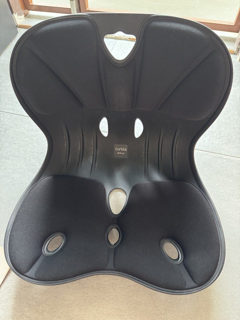 Back support (Category: Braces, Support & Protection) located in Singapore. Submitted by randy789 (Listing ID 1453308445, Image 1). Description: Selling Ablue Curble posture correction chair (wide) for $15. Colour: Black Able to deal from Jurong East station to Outram park station. .
