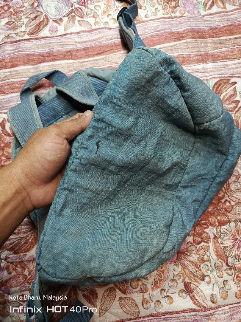 Backpack Kipling (Category: Backpacks) located in Kuala Lumpur. Submitted by grandturtle_dd5ca3 (Listing ID 1453422771, Image 3). Description: Brand: Kipling Model: Likely Challenger Material: Nylon.