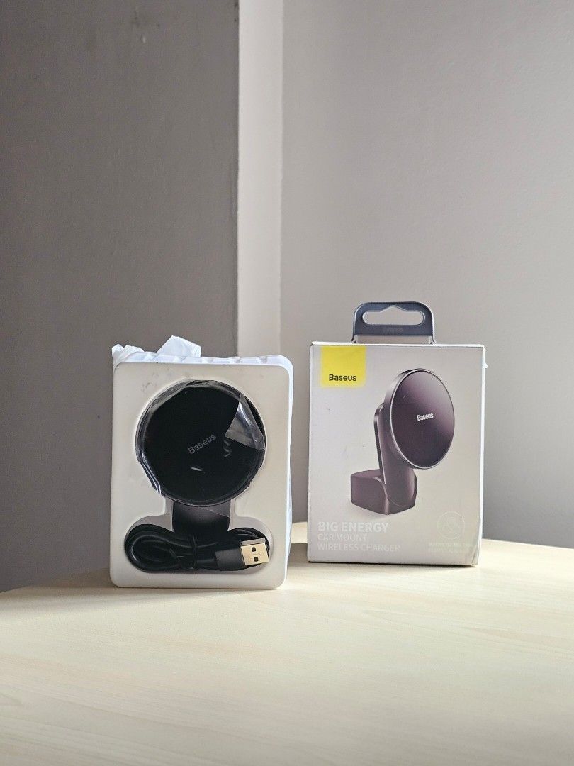 Baseus Big Energy Car Mount Wireless Charger (Category: Chargers & Cables) located in Paranaque City. Submitted by mab.villareal (Listing ID 1453296357, Image 2). Description: - Baseus Big Energy Car Mount Wireless Charger - Color: Black - Functions as a wireless charger for your phone - Conveniently attaches to your car's air vent - Includes USB cable for charging - Ideal for keeping your phone powered up while driving.