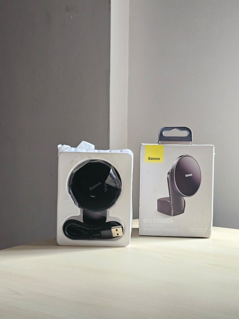 Baseus Big Energy Car Mount Wireless Charger (Category: Chargers & Cables) located in Paranaque City. Submitted by mab.villareal (Listing ID 1453296357, Image 1). Description: - Baseus Big Energy Car Mount Wireless Charger - Color: Black - Functions as a wireless charger for your phone - Conveniently attaches to your car's air vent - Includes USB cable for charging - Ideal for keeping your phone powered up while driving.