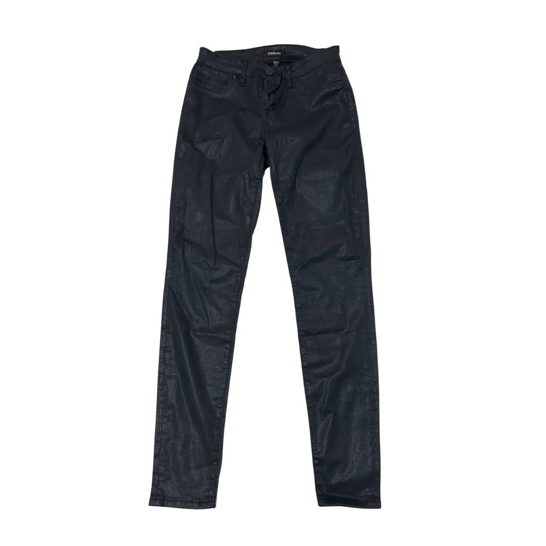 BEBE Black Coated Skinny Jeans (Category: Jeans) located in Pasig City. Submitted by polyhedra_ (Listing ID 1453342138, Image 2). Description: - Brand: BEBE - Style: Black coated skinny jeans - Size: 28 - Features: Slight sheen, comfortable fit - Versatile: Perfect for dressing up or down Pre-loved clothes available for sale 💗 RFS: Decluttering. All items in my shop are imported or have been bought abroad. NONE are thrifted unless stated otherwi