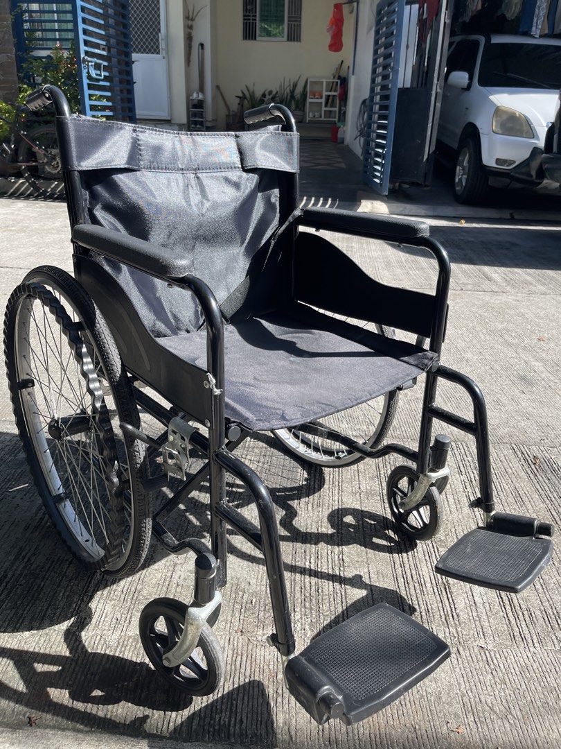 Black Folding Wheelchair with Large Wheels (Category: Wheelchairs) located in Rizal. Submitted by royale23 (Listing ID 1453271258, Image 3). Description: - Standard wheelchair for mobility - Folds easily for storage and transport - Large rear wheels for enhanced stability - Padded armrests and backrest for maximum comfort - Ready for its next owner - Ideal for everyday use and getting around.