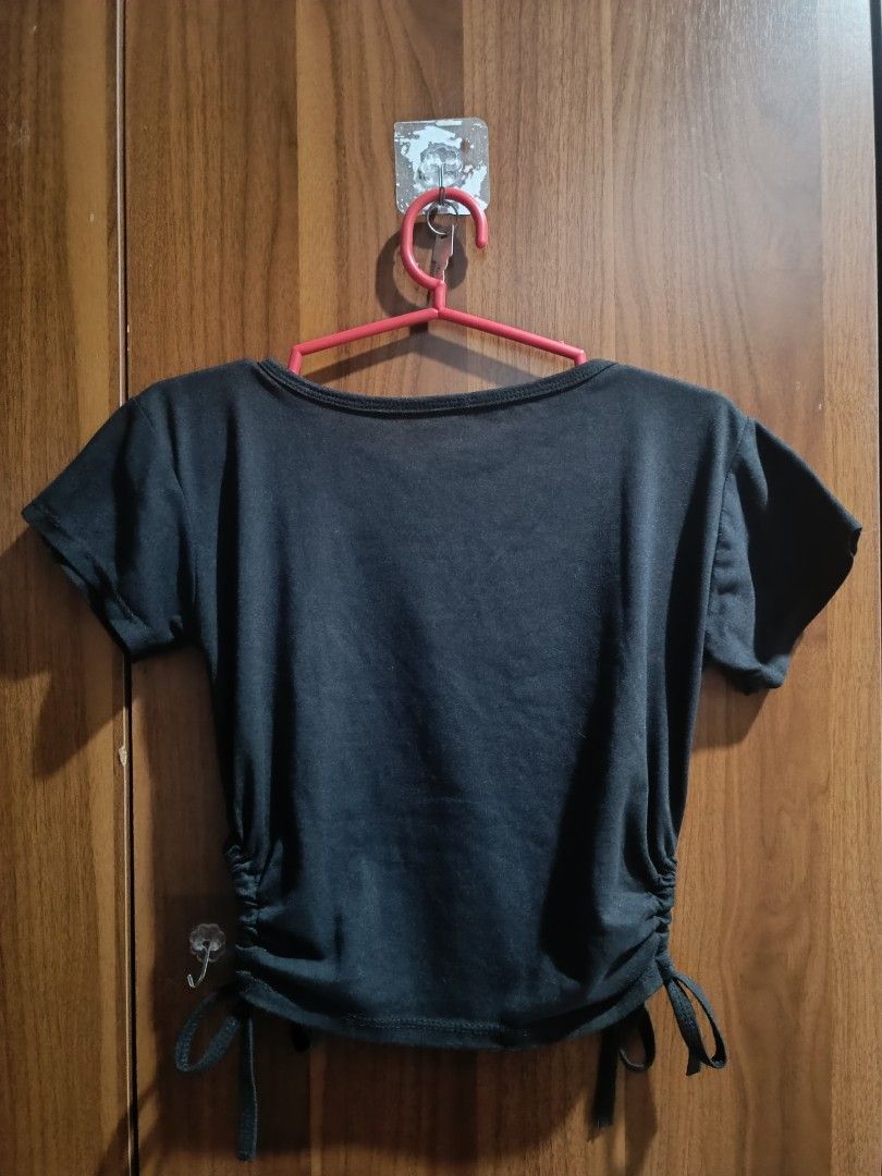 Black Ruched Drawstring Crop Top (Category: Others Tops) located in Manila. Submitted by pre_lovie_stuff02 (Listing ID 1453425307, Image 2). Description: - Black short-sleeve crop top - Features ruching and adjustable drawstrings on the sides - Customize the length to your preference - Versatile and easy to style for casual outfits.
