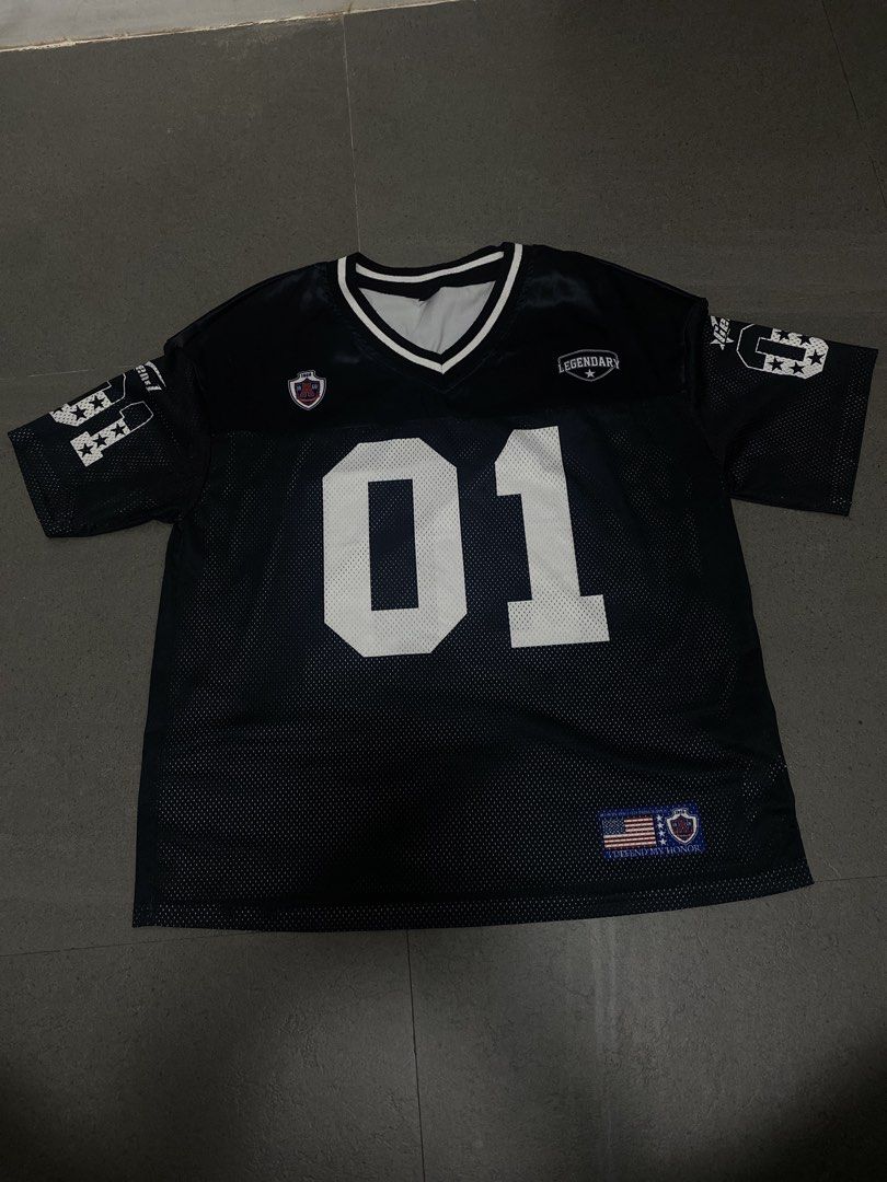 Black Varsity Jersey "01" with White Accents (Category: Activewear) located in Manila. Submitted by ellianaaaa (Listing ID 1453315847, Image 1). Description: - Black mesh jersey - '01' graphic on front and back - White star and stripe details on sleeves - V-neck collar - Sports-inspired streetwear design - Ideal for casual wear or making a statement - Small to Large.