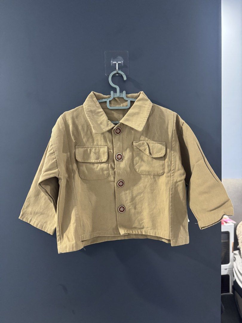Brown jacket (Category: Babies & Kids Fashion) located in Singapore. Submitted by mayechanmeimei (Listing ID 1453414599, Image 1). Description: 100cm&120cm Both sold for $10.