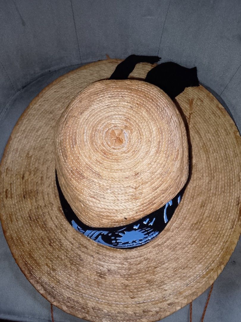 Cabo San Lucas Straw Sun Hat (Category: Hats & Beanies) located in Binangonan. Submitted by yuristalin888 (Listing ID 1453258262, Image 3). Description: - Wide brim straw hat - Black band with blue design and 'Cabo San Lucas' text - Features a chin strap - Perfect for sunny days, beach, or casual outings - Made in Mexico .