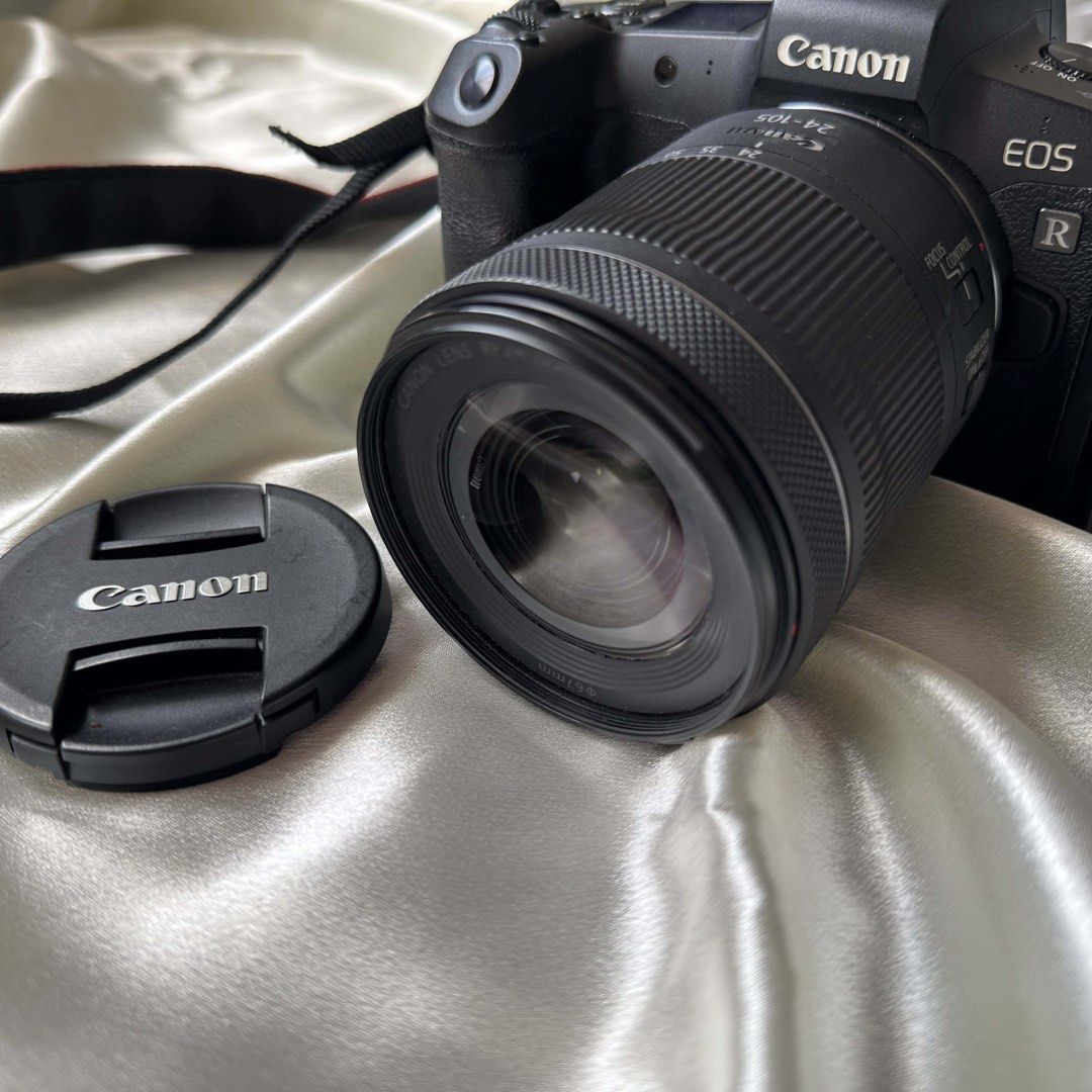 Canon EOS R Mirrorless Camera (Category: Cameras) located in General Mariano Alvarez. Submitted by thiirdy29 (Listing ID 1453354898, Image 3). Description: - Canon EOS R Mirrorless Camera BODY ONLY - RF 24-105mm Lens + 12k - Original Strap and Lens Cap - Attached Cage for Enhanced Grip & Mounting - Ideal for Both Photography and Videography - Ready for Your Next Creative Project.