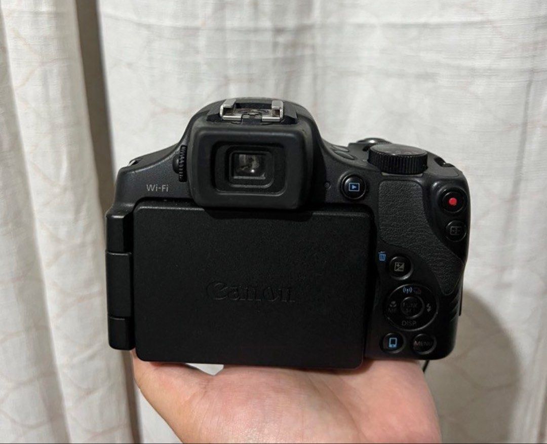 Canon PowerShot SX60 HS Digital Camera with Bag (Category: Cameras) located in Manila. Submitted by mj3yl (Listing ID 1453305710, Image 2). Description: - Have a 16.1 megapixel - Wi-fi & NFC capabilities - 6.4fps continuous shooting - 65x Optical Zoom 21 - 1365mm (35mm equivalent), f/3.4 - f/6.5 lens - Full HD 60p movie - Manual movie mode Things Included: - Charger - Camera Bag - Camera Strap Issue: The screen doesn’t work, the camera itself is 