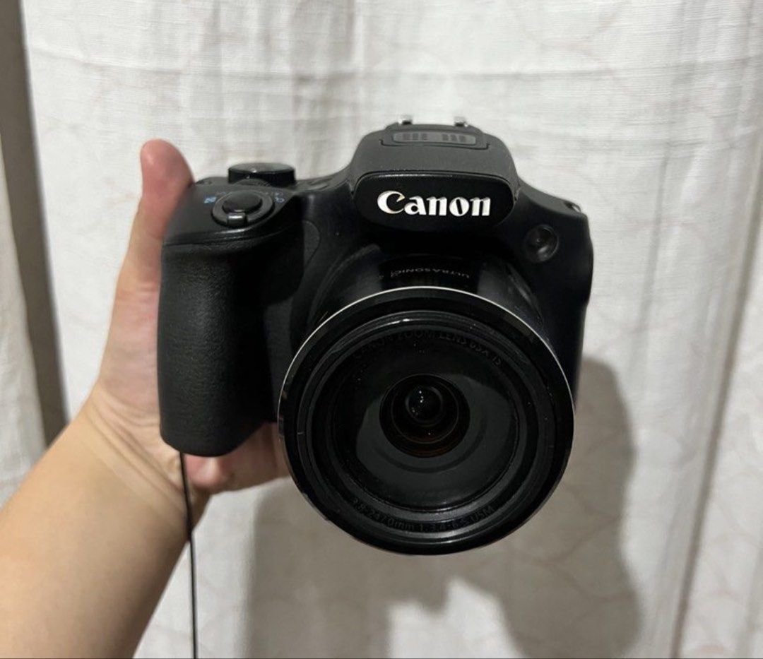 Canon PowerShot SX60 HS Digital Camera with Bag (Category: Cameras) located in Manila. Submitted by mj3yl (Listing ID 1453305710, Image 1). Description: - Have a 16.1 megapixel - Wi-fi & NFC capabilities - 6.4fps continuous shooting - 65x Optical Zoom 21 - 1365mm (35mm equivalent), f/3.4 - f/6.5 lens - Full HD 60p movie - Manual movie mode Things Included: - Charger - Camera Bag - Camera Strap Issue: The screen doesn’t work, the camera itself is 