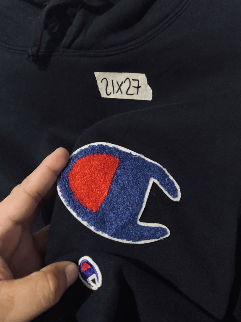 Champion Reverse Weave Navy Blue Hoodie (Category: Hoodies) located in Manila. Submitted by sesbrenojames11 (Listing ID 1453263433, Image 2). Description: - Champion Hoodie - Color: Navy Blue - Size: Medium - Features classic C logo patch on chest - Made in China - Perfect for everyday wear - Please check photos for condition details.