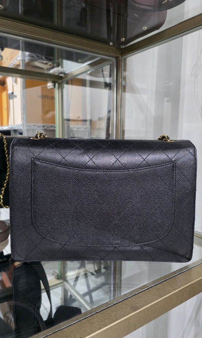 Chanel Black Caviar Single Flap Single Chain (Category: Luxury Bags & Wallets) located in San Fernando. Submitted by bagproject (Listing ID 1453409542, Image 3). Description: - Classic black Chanel Flap - Made with durable caviar leather - Features the iconic Chanel logo clasp - Plenty of interior space - Timeless and essential for everyday organization on the go - With Zeko - With Entrupy - With Card - Vintage but fresh and on excellent conditio