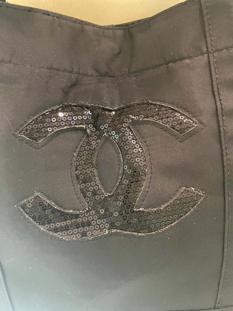 Chanel Black Sequin CC Tote Bag (Category: Luxury Bags & Wallets) located in Manila. Submitted by luxblocc (Listing ID 1453271119, Image 2). Description: - Iconic Chanel tote bag - Features black sequined CC logo - Made from durable material - Spacious interior - Ideal for everyday use or travel - Classic Chanel piece.