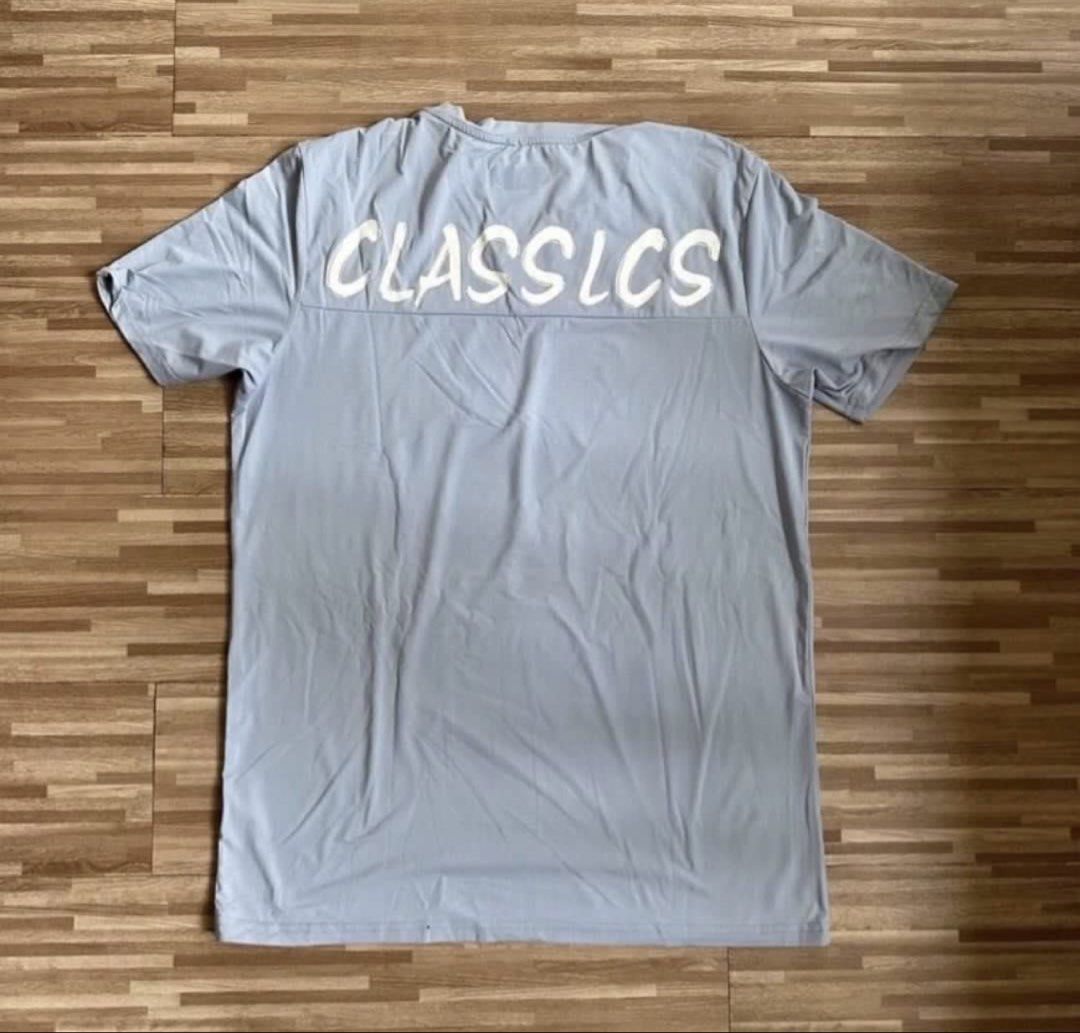 Classics Grey T-shirt Size S (Category: Tshirts & Polo Shirts ) located in Marilao. Submitted by extra_stuff (Listing ID 1453252996, Image 3). Description: - Grey t-shirt from Classics - Size S - Classics logo on front and back - Suitable for casual wear or sports - Comfortable material.