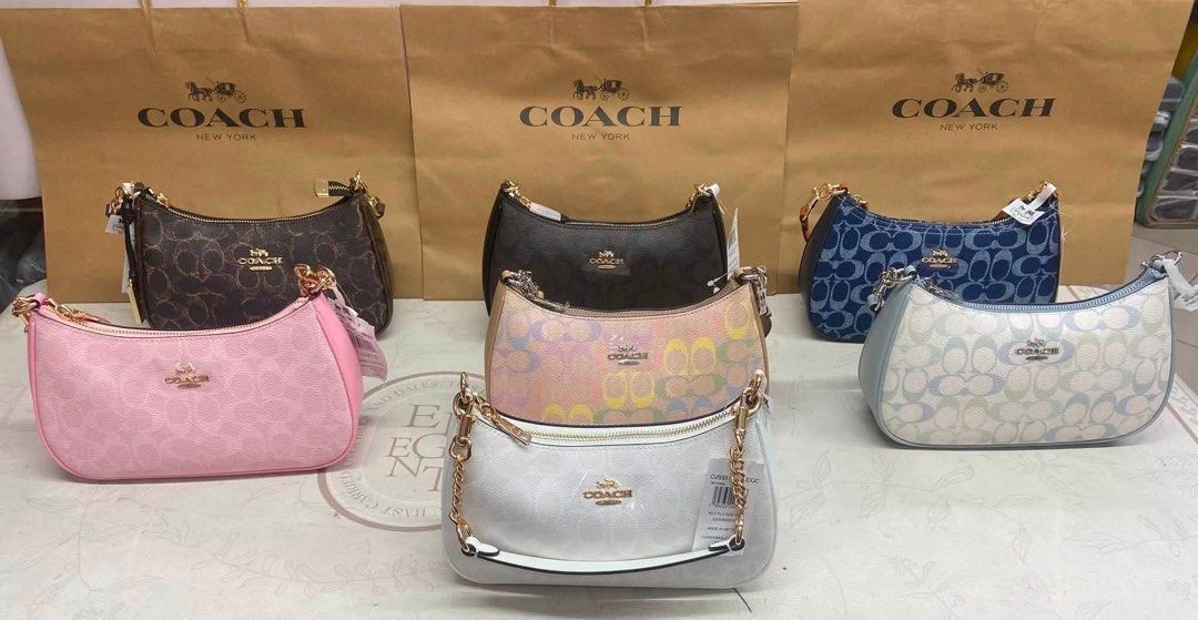 Coach bag (Category: Luxury Bags & Wallets) located in Manila. Submitted by jay_cee241623 (Listing ID 1453274738, Image 2). Description: SUPERSALE COACH BAG 🖇 2,500 each + SF 💯Brand new Made in Vietnam 💯% Complete Inclusions - Signature Coach print - Adorable cherry charm included - Versatile for everyday use.