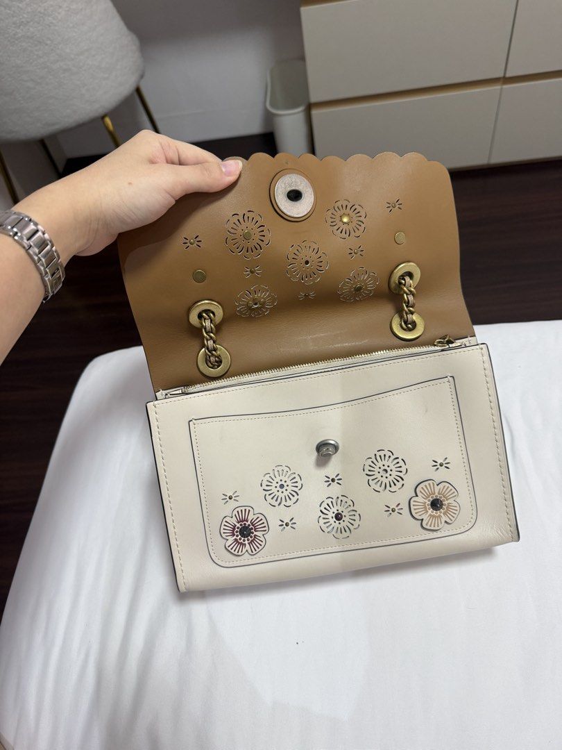 Coach Parker tea rose cutout (Category: Luxury Bags & Wallets) located in Quezon City. Submitted by tiaraless_ (Listing ID 1453242062, Image 3). Description: Original Coach Parker Tea Rose Cutout. Used with some signs of use. With dust bag.