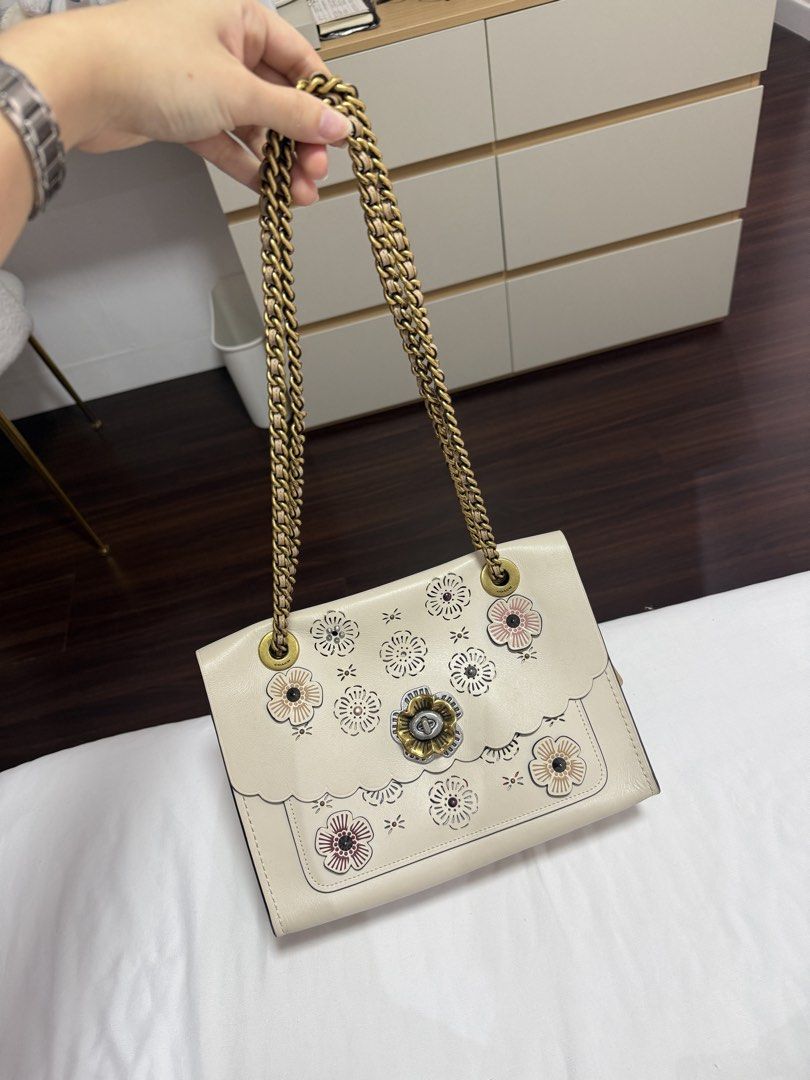 Coach Parker tea rose cutout (Category: Luxury Bags & Wallets) located in Quezon City. Submitted by tiaraless_ (Listing ID 1453242062, Image 1). Description: Original Coach Parker Tea Rose Cutout. Used with some signs of use. With dust bag.