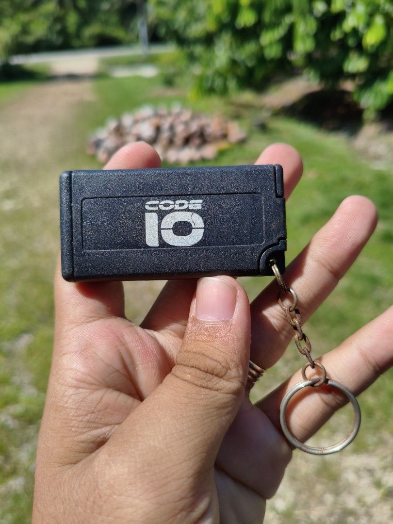 CODE 10 Keychain Multi-tool with Screwdriver Bits (Category: Craft Supplies & Tools) located in Muar. Submitted by cai_vtg (Listing ID 1453311495, Image 1). Description: - Compact keychain multi-tool by CODE 10 - Features multiple screwdriver bits stored inside - Small and portable for everyday carry (EDC) - Ideal for quick on-the-go repairs - Comes with a metal keychain ring.