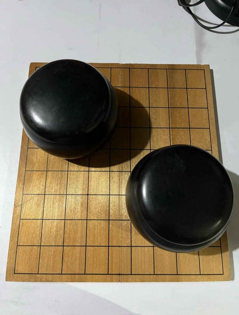 Complete Go Stones (Category: Educational & Learning Toys) located in Abucay. Submitted by garuj (Listing ID 1453264894, Image 3). Description: Go stones 181 black & 180 white stones good condition wood board 250php.