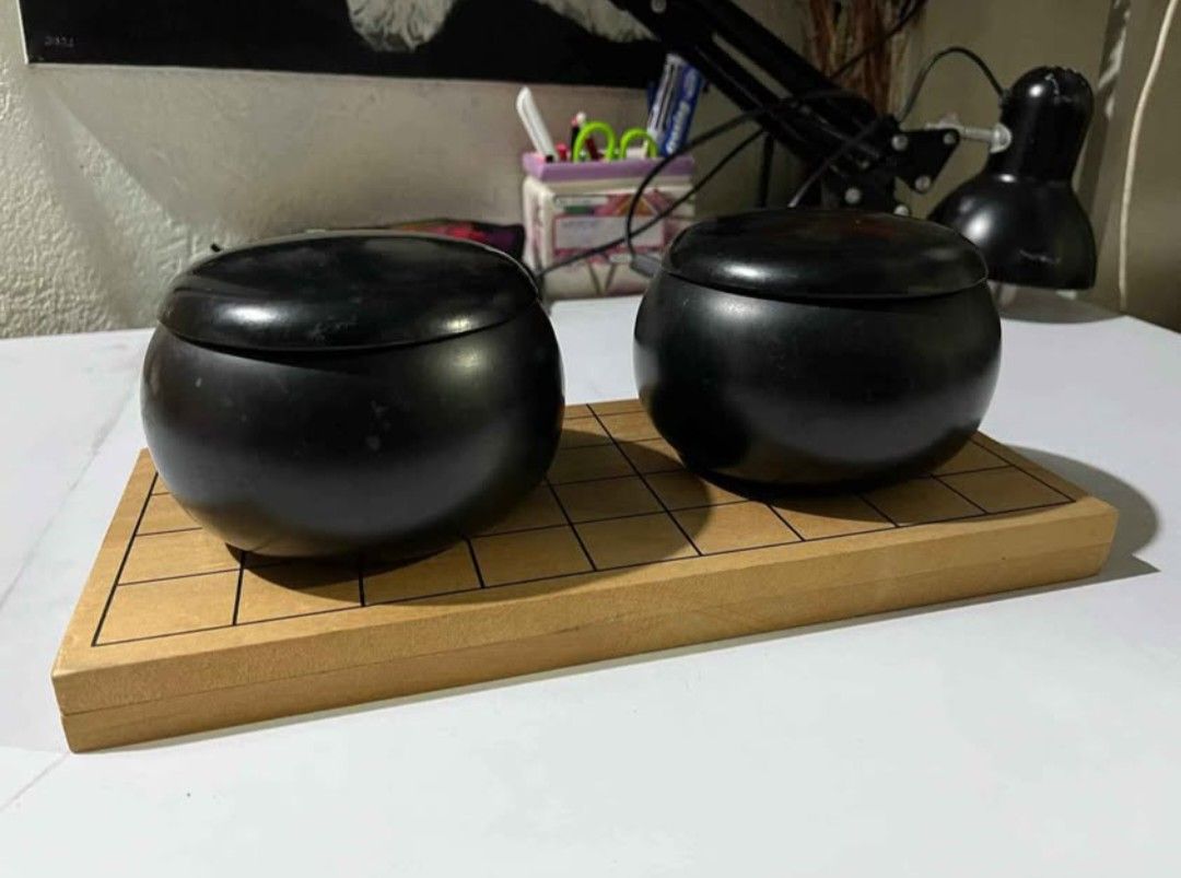 Complete Go Stones (Category: Educational & Learning Toys) located in Abucay. Submitted by garuj (Listing ID 1453264894, Image 2). Description: Go stones 181 black & 180 white stones good condition wood board 250php.