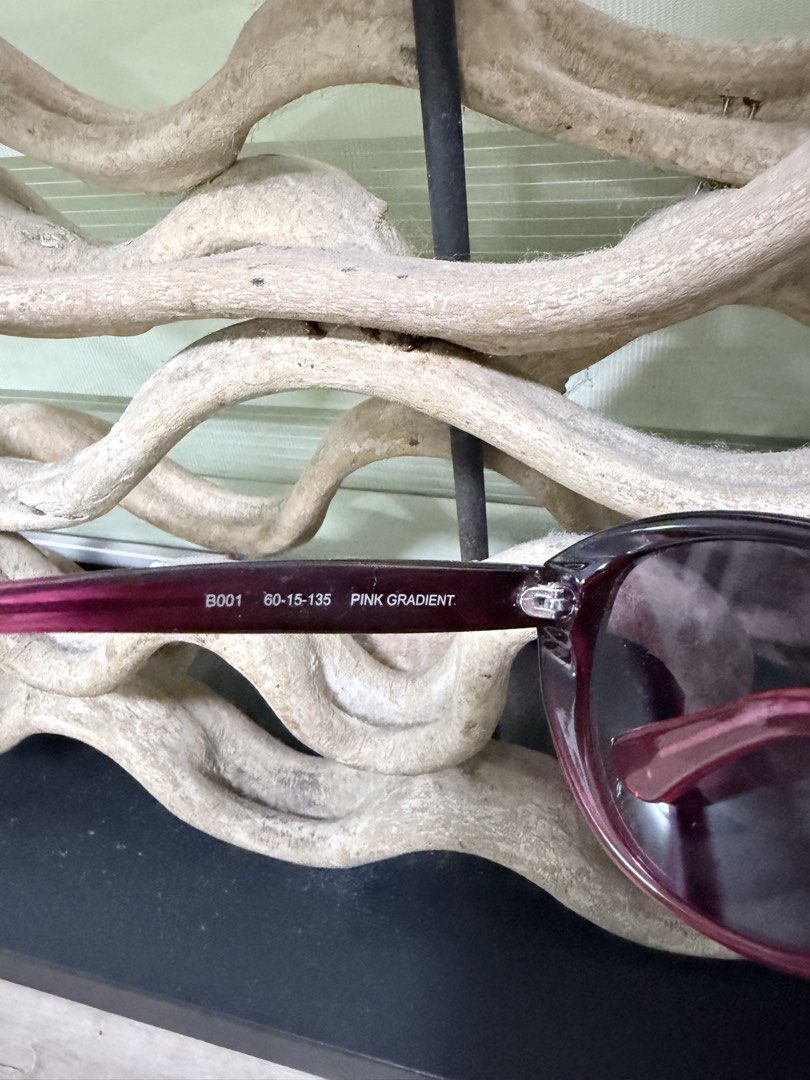 Converse All Star Sunglasses Pink Gradient CAT 3 (Category: Sunglasses & Eyewear) located in Pasig City. Submitted by iambernabe (Listing ID 1453243788, Image 3). Description: - Converse All Star Sunglasses (Model B001) - Chic pink gradient lenses - Dark purple/burgundy frame - Lens width: 60mm - Bridge: 15mm - Temple length: 135mm - Comes with a black pouch - Ideal for sunny weather.