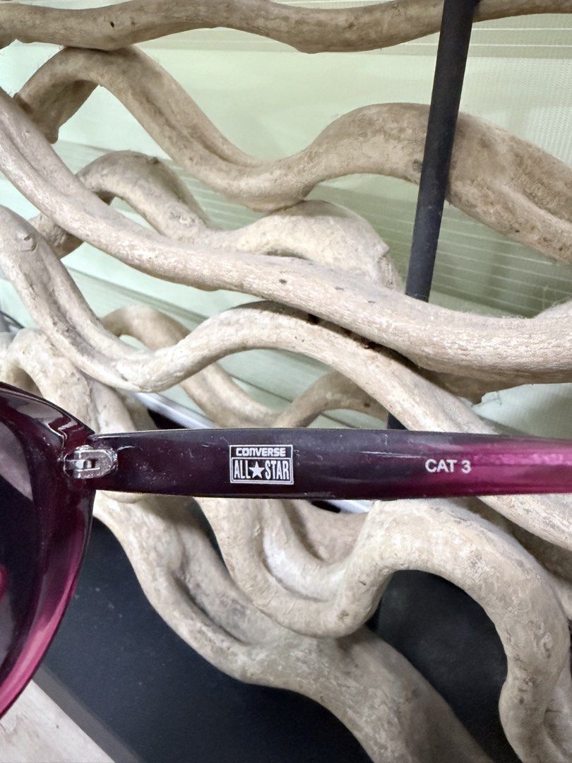Converse All Star Sunglasses Pink Gradient CAT 3 (Category: Sunglasses & Eyewear) located in Pasig City. Submitted by iambernabe (Listing ID 1453243788, Image 2). Description: - Converse All Star Sunglasses (Model B001) - Chic pink gradient lenses - Dark purple/burgundy frame - Lens width: 60mm - Bridge: 15mm - Temple length: 135mm - Comes with a black pouch - Ideal for sunny weather.