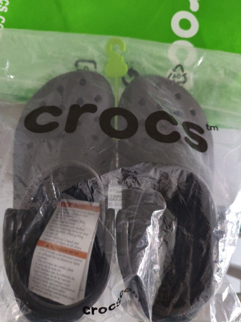 Crocs Black (Category: Flipflops and Slides) located in Singapore. Submitted by mrssan (Listing ID 1453240621, Image 2). Description: black classic crocs size (M)4 (W)6 came as seen in pic..full pkt bought from a carouseller @ $36 but got a wrong colour..looking for dark blue. willing to let go at $20 for fast deal only meet up.