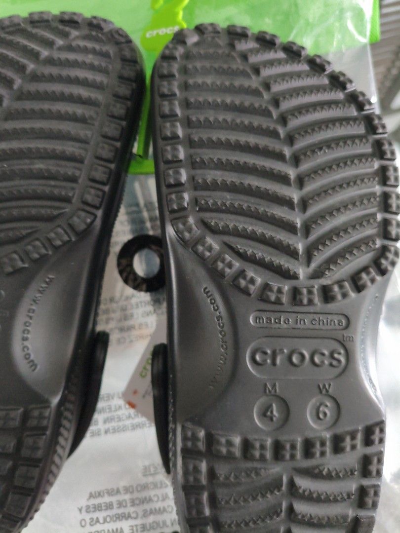 Crocs Black (Category: Flipflops and Slides) located in Singapore. Submitted by mrssan (Listing ID 1453240621, Image 6). Description: black classic crocs size (M)4 (W)6 came as seen in pic..full pkt bought from a carouseller @ $36 but got a wrong colour..looking for dark blue. willing to let go at $20 for fast deal only meet up.