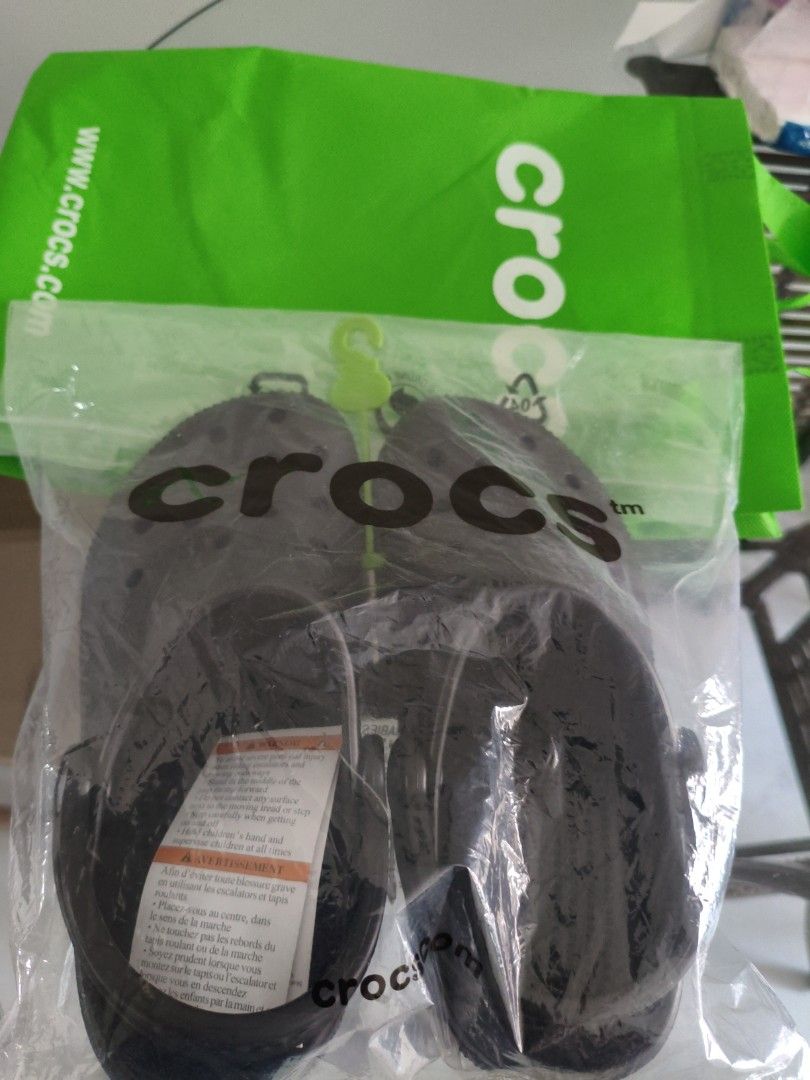Crocs Black (Category: Flipflops and Slides) located in Singapore. Submitted by mrssan (Listing ID 1453240621, Image 1). Description: black classic crocs size (M)4 (W)6 came as seen in pic..full pkt bought from a carouseller @ $36 but got a wrong colour..looking for dark blue. willing to let go at $20 for fast deal only meet up.