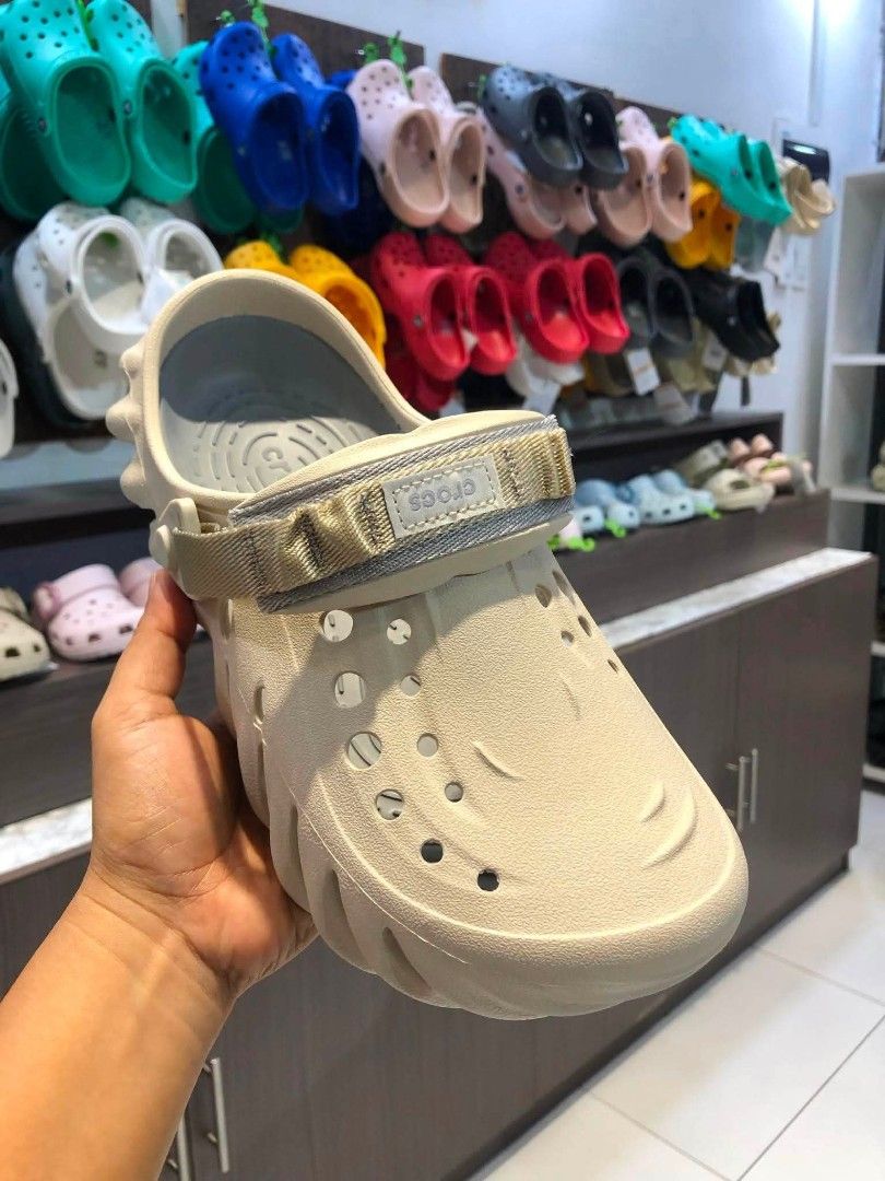 Crocs Echo Clog Sandal Beige (Category: Slippers & Slides) located in Cebu City. Submitted by madeskartegirl (Listing ID 1453305950, Image 2). Description: ORIGINAL FACTORY PULL OUT AVAILABLE FOR MEN AND WOMEN 😍 COMPLETE INCLUSIONS ✅ Hanger✅ Tag✅ Sealed ziplock✅ Crocsbag✅ Location : Cebu city WE SHIP NATIONWIDE Brand new beige Crocs Echo Clogs - Unique, chunky design - Adjustable strap (wear up or down) - Ultimate comfort and style - Perfect for