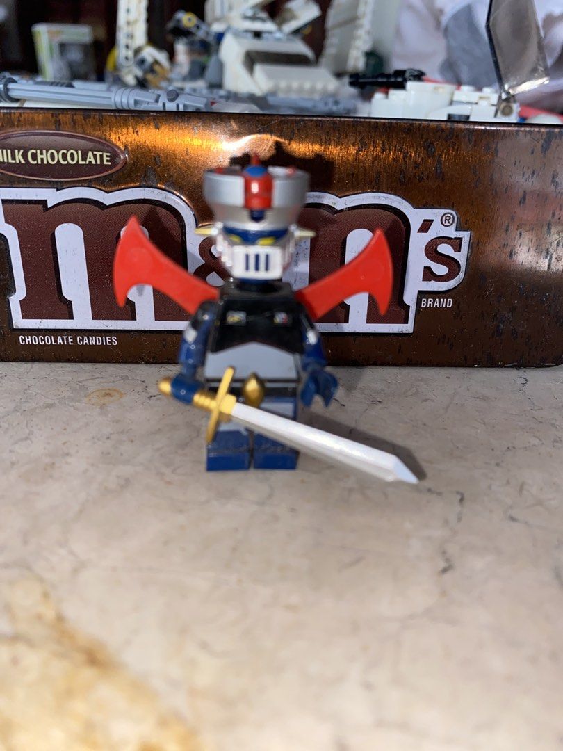 Custom Mazinger Z Minifigure with Sword and Jet Pack (Category: Figurines & Statues) located in Marikina City. Submitted by jtv17 (Listing ID 1453428782, Image 1). Description: - Custom Mazinger Z minifigure - Includes sword accessory - Comes with a separate red jet pack piece - Ideal for collectors and fans of Mazinger Z - Great display piece.