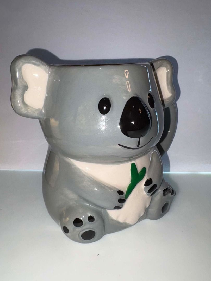 Cute Koala 3D Ceramic Mug (Category: Coffee & Tea Tableware) located in Caloocan City. Submitted by rabbithole2026 (Listing ID 1453382022, Image 2). Description: 🐨 Adorable Koala Ceramic Mug Cute 3D ceramic mug featuring a lovable koala holding a green eucalyptus leaf. Designed with sculpted ears, paws, and facial details, this charming mug is perfect for coffee, tea, hot chocolate, or display. Features: Cute koala character design 3D sculpted d