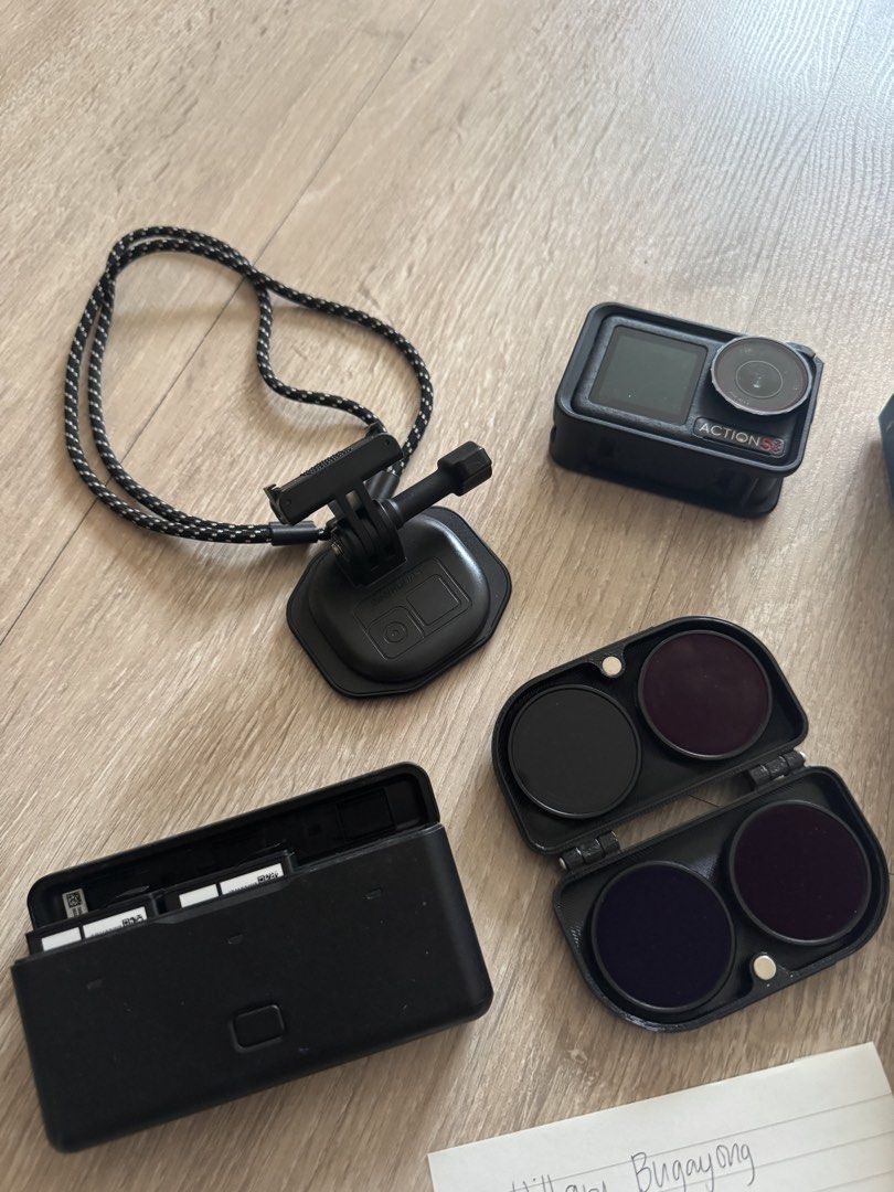 DJI Osmo Action 5 Pro with Accessories (Category: Cameras) located in Manila. Submitted by x.hillary (Listing ID 1453353907, Image 2). Description: - DJI Osmo Action 3 camera - Includes charging case - Comes with lanyard - Lens filters included - Ideal for adventure filming and memory capture - Sold as a complete set.