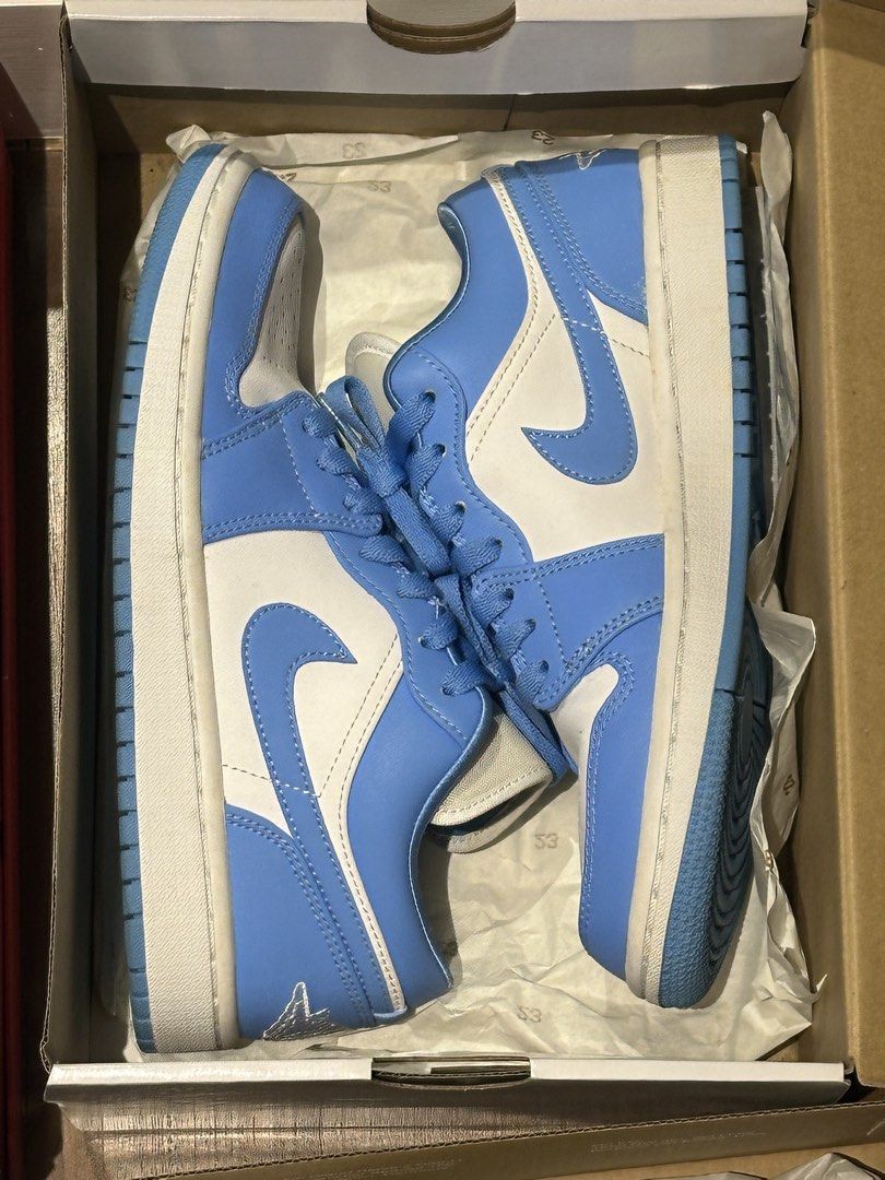Dunk Low UNC 7.5W (Category: Sneakers) located in Quezon City. Submitted by shangotswag (Listing ID 1453261896, Image 1). Description: Dunk Low UNC Size 7.5W Like new - No issues Complete with box.