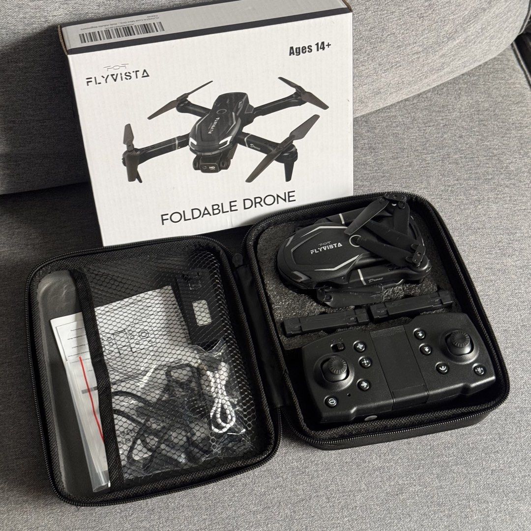FLYVISTA Foldable Drone (Category: Drones) located in Quezon City. Submitted by marketbuenaobra (Listing ID 1453275694, Image 1). Description: - Authentic - BNEW, unused - Comes as a full set. Kit, Manual, Charger, Drone, Remote - Selling low. Rfs: decluttering.
