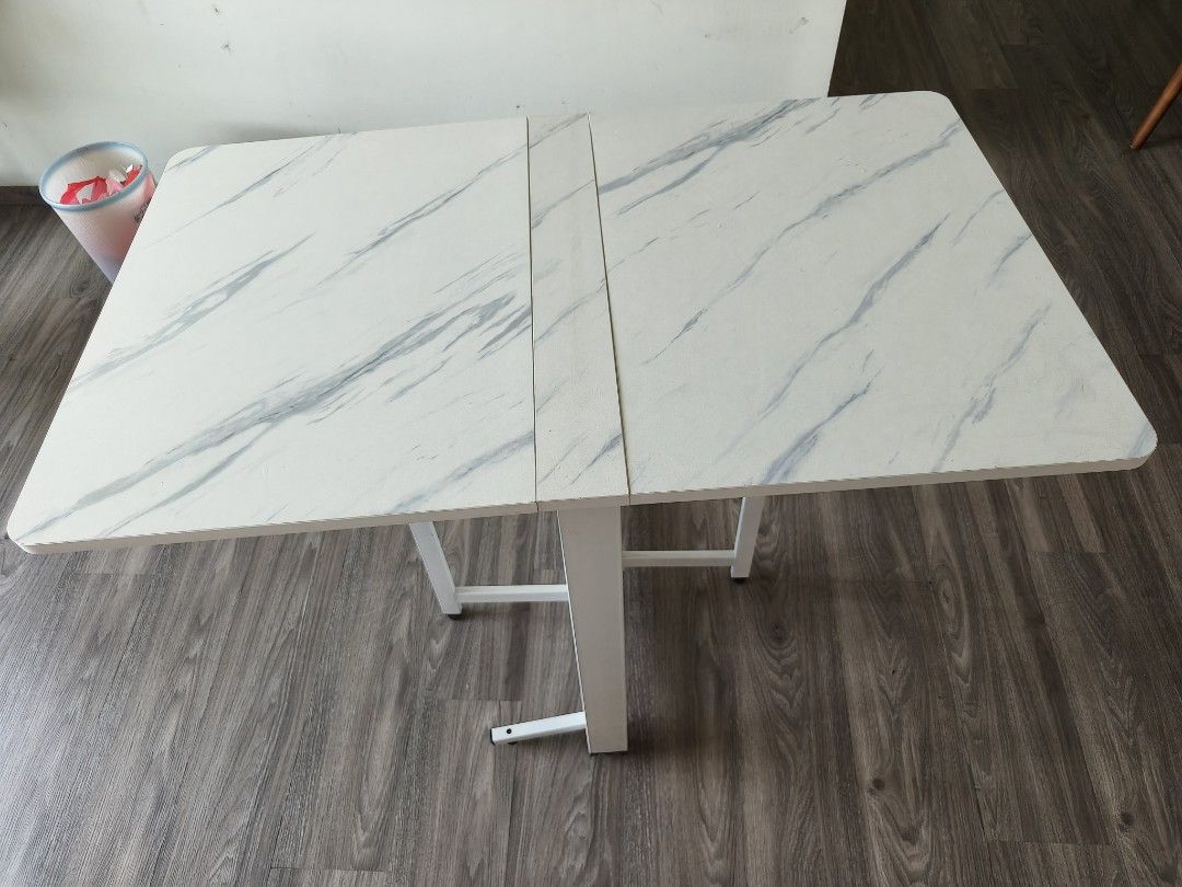 Foldable table (Category: Tables & Sets) located in Singapore. Submitted by wowhousewares (Listing ID 1453328109, Image 1). Description: bottom 1 foot is lost, so it's not even like the picture 3.