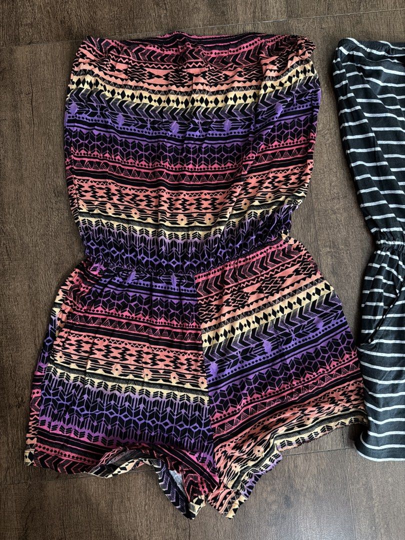 Forever 21 Strapless Rompers (Set of 2) (Category: Rompers) located in Antipolo. Submitted by sugarpop.mnl (Listing ID 1453269151, Image 2). Description: - Two cute strapless rompers from Forever 21 - Size: S - Style 1: Colorful tribal print - Style 2: Black and white striped - Features: Elastic waistband, pockets on both - Perfect for: Casual wear, beach days.