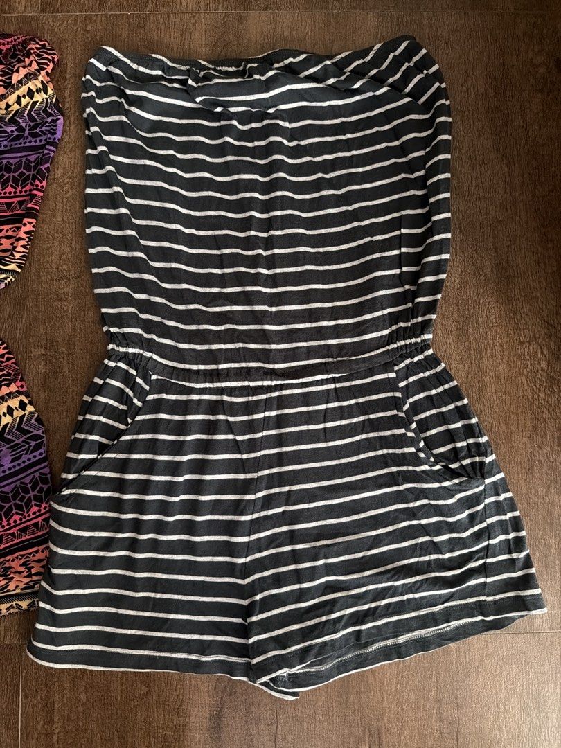 Forever 21 Strapless Rompers (Set of 2) (Category: Rompers) located in Antipolo. Submitted by sugarpop.mnl (Listing ID 1453269151, Image 3). Description: - Two cute strapless rompers from Forever 21 - Size: S - Style 1: Colorful tribal print - Style 2: Black and white striped - Features: Elastic waistband, pockets on both - Perfect for: Casual wear, beach days.