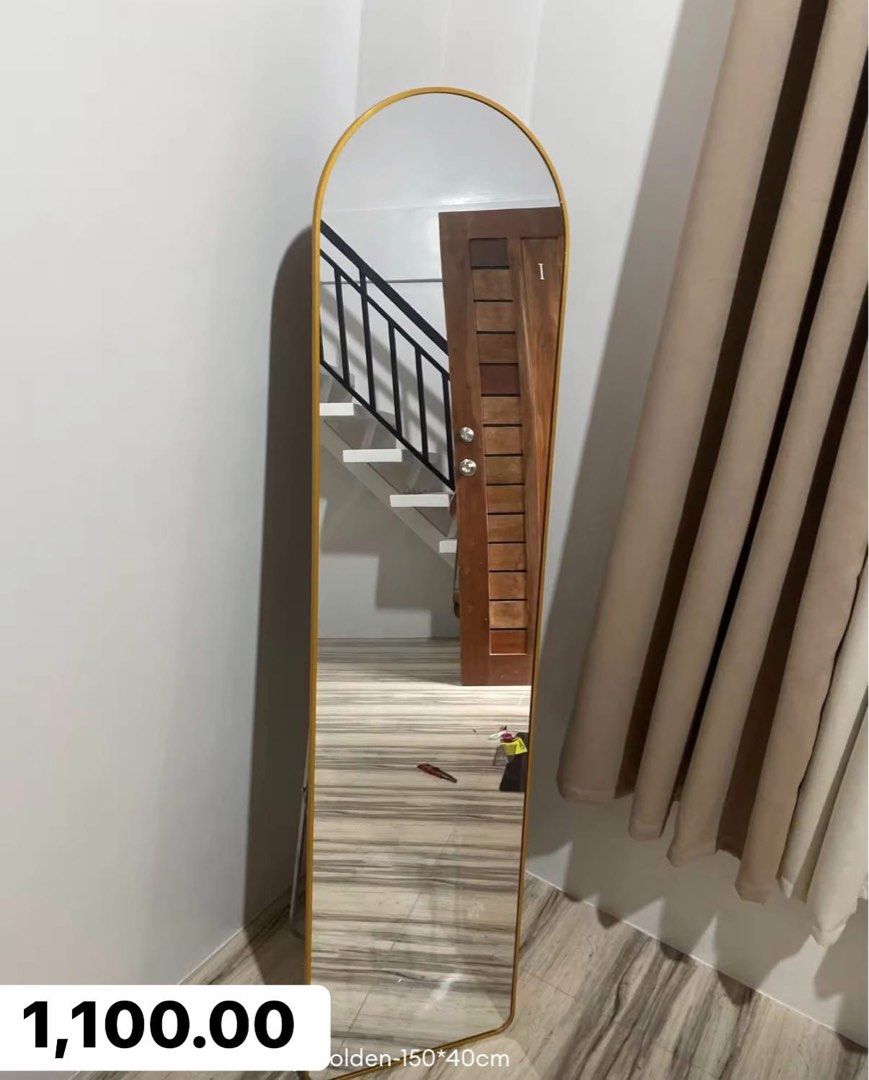 Full-body Arch Mirror (150x40cm) - Gold Frame (Category: Mirrors) located in Quezon City. Submitted by truewhale.5f8ec0 (Listing ID 1453281696, Image 2). Description: - Full-body mirror with a chic gold frame - Arched top design for a touch of elegance - Generous size: 150cm tall x 40cm wide - Versatile: Can be used as a floor mirror or wall-mounted - Ideal for checking your complete outfit before stepping out 🏷️1,100.00 negotiable 📍Sauyo Noval